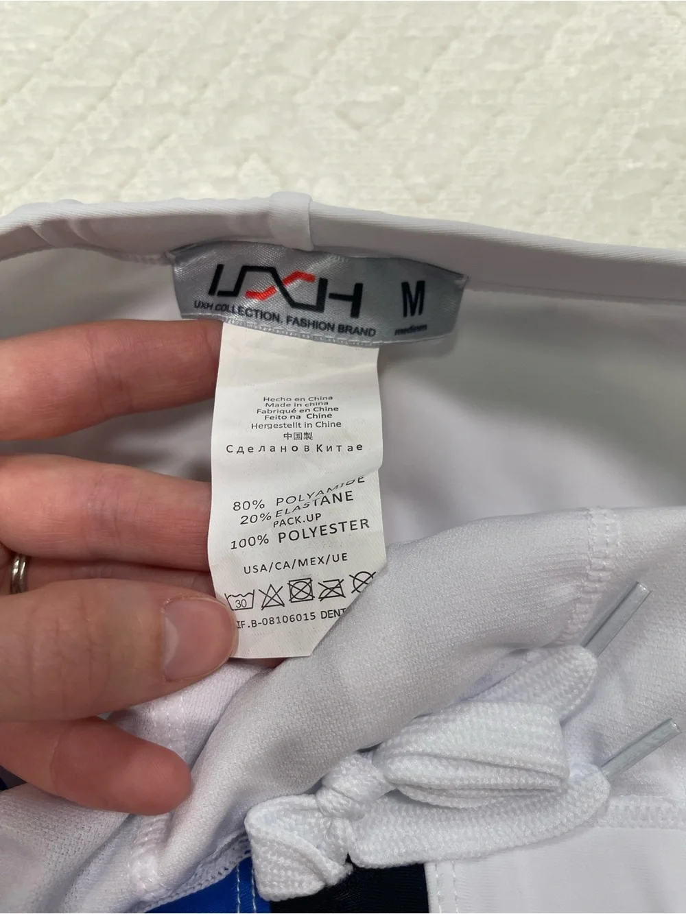 UXH Men's Colorblock Swim Briefs in White and Blue